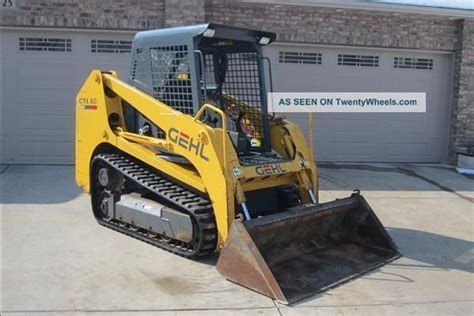 2002 gehl skid steer with metal tracks|heat treated skid steer tracks.